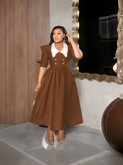 Brown midi dress with puff sleeves and white contrast collar, button front flare