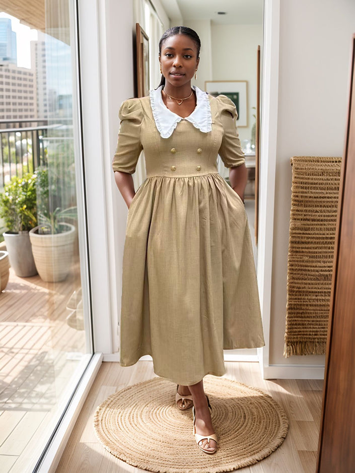 Tan midi dress with puff sleeves, white contrast collar, gathered waist button front