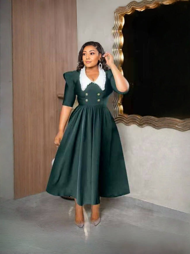 Dark green midi dress with puff sleeves, white contrast collar, fitted bodice