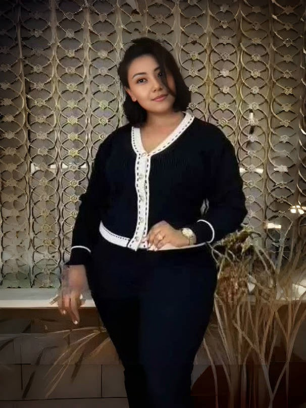 Black knit V-neck cardigan with white trim and button front