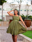 Green printed sleeveless A-line dress with gathered ruffle hem and square neckline