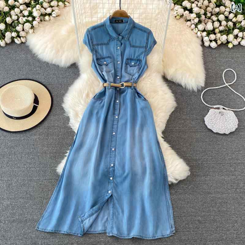 Light blue denim maxi shirt dress with cap sleeves, button front, and waist belt