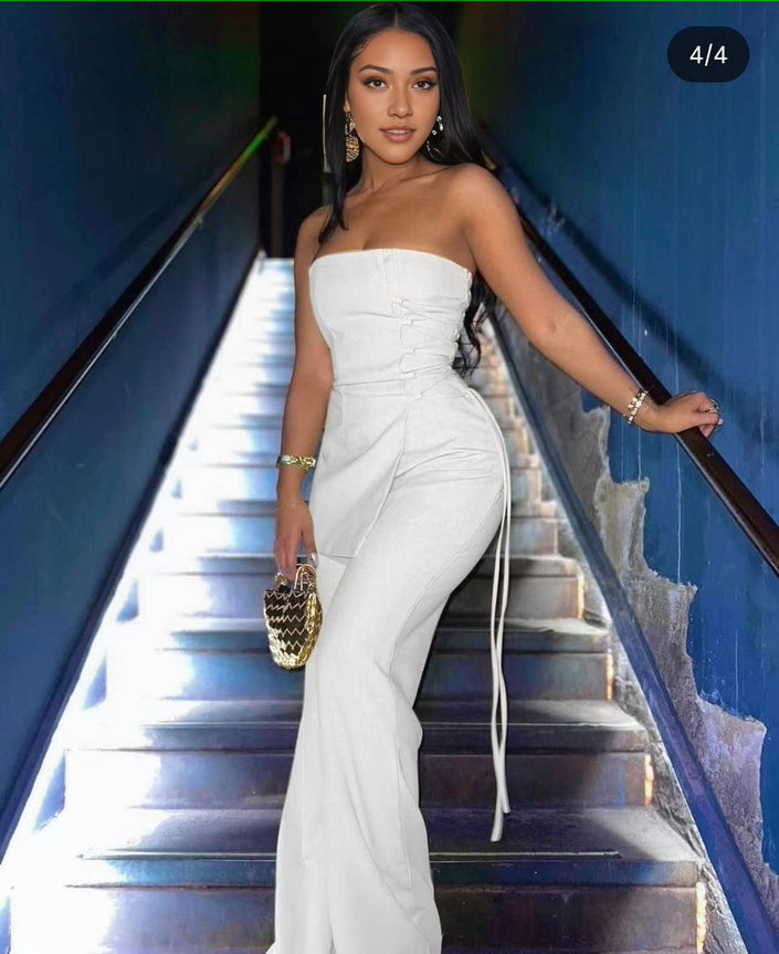 White strapless wide-leg jumpsuit with side ties and fitted bodice