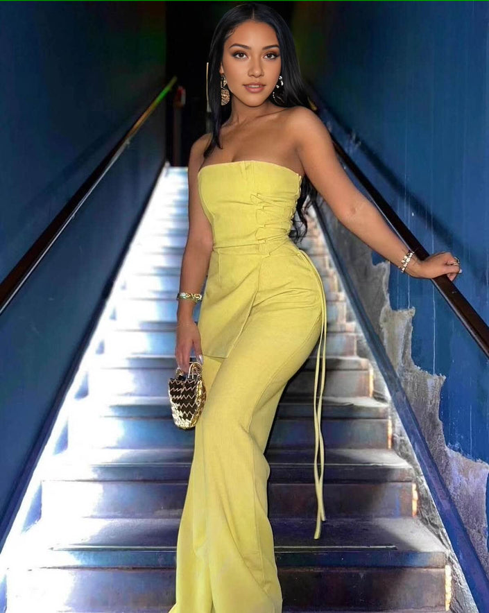 Lemon yellow strapless wide-leg jumpsuit with side ties and fitted bodice