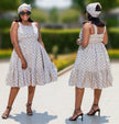 Sleeveless midi dress with geometric print, flared skirt and scoop neckline