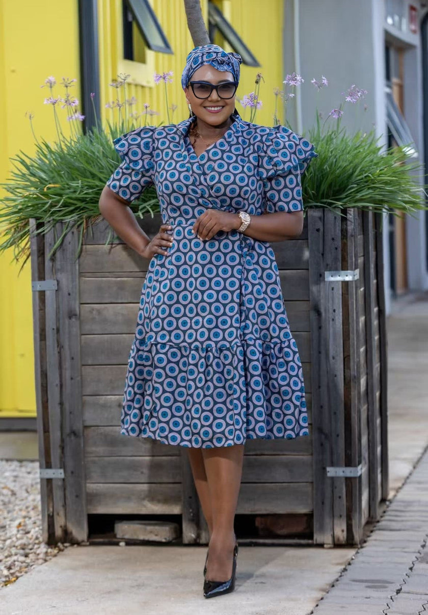 Blue polka dot midi dress with puff sleeves and ruffled skirt, A-line fit