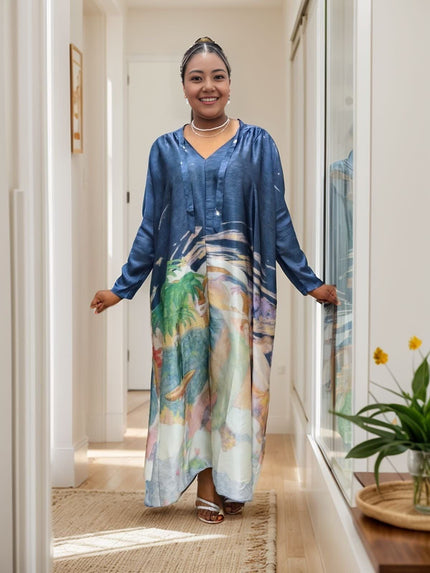 Loose-fitting printed dress with tropical landscape pattern and unique neckline design
