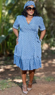 Blue geometric wrap midi dress with short sleeves and ruffled hem