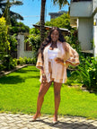 Tan striped sheer shorts set with a loose, open-front top and wide sleeves