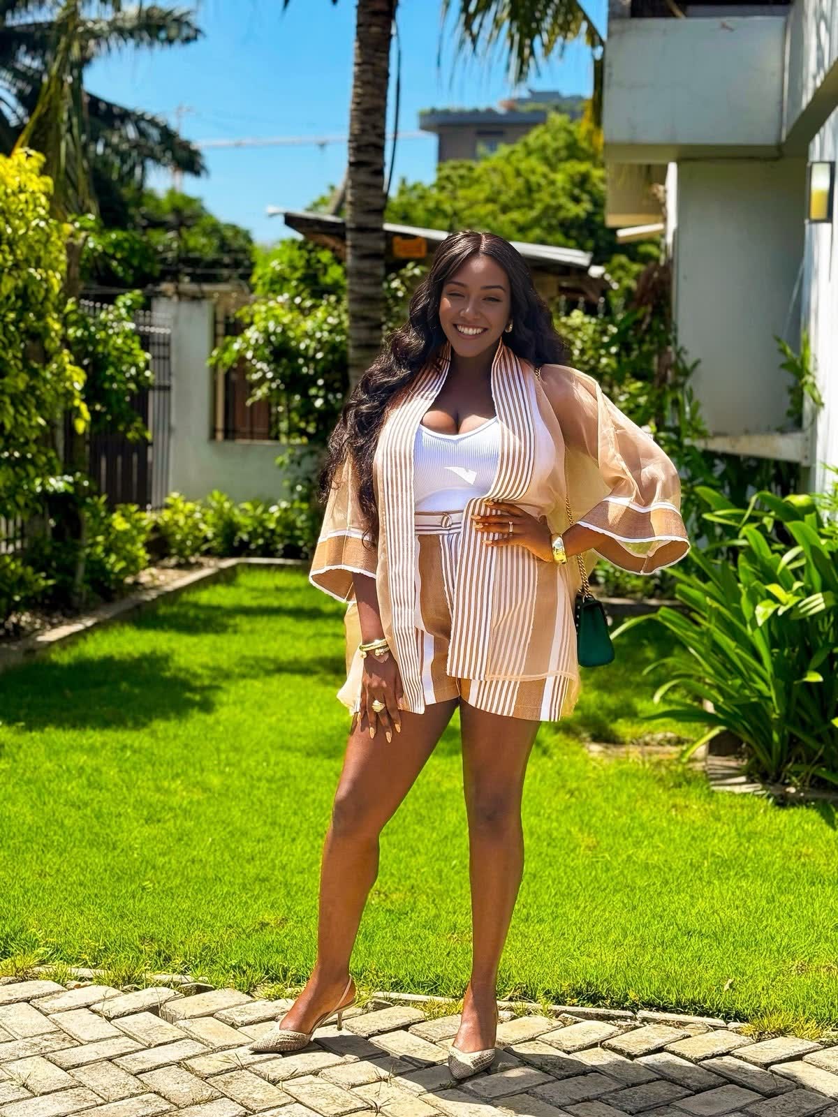 Tan striped sheer shorts set with a loose, open-front top and wide sleeves
