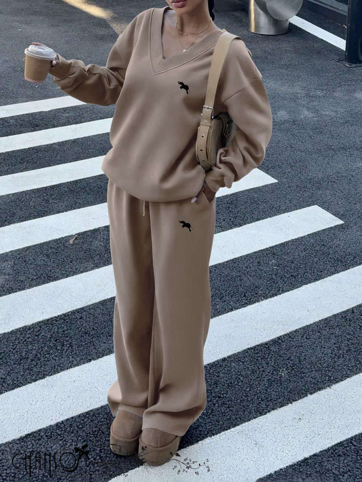 Khaki V-neck twin set with dog embroidery: loose sweatshirt top and wide-leg pants.