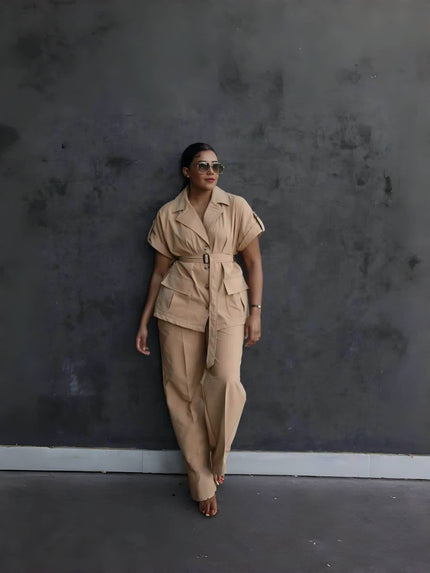 Nude belted lapel pantsuit with short sleeves and matching straight-leg trousers