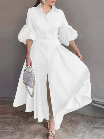 White belted maxi dress with puff sleeves and a V-neck, full skirt