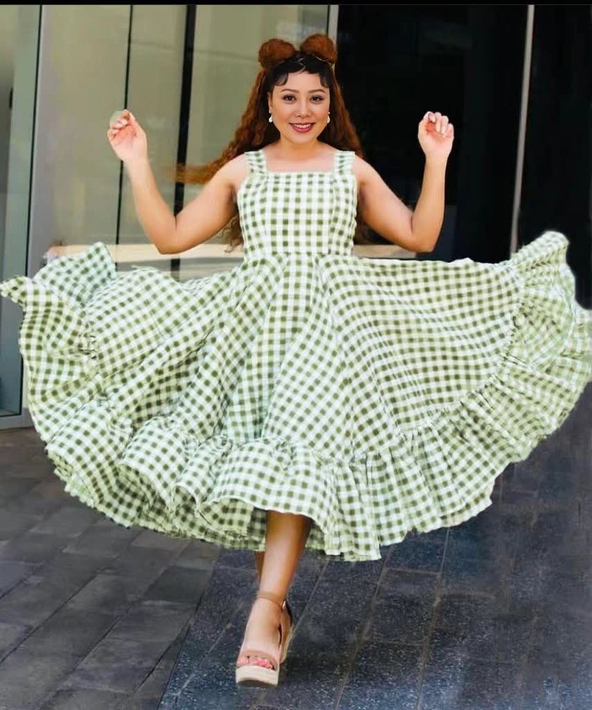 Green and white check sleeveless maxi dress with puffed shoulders and tiered skirt