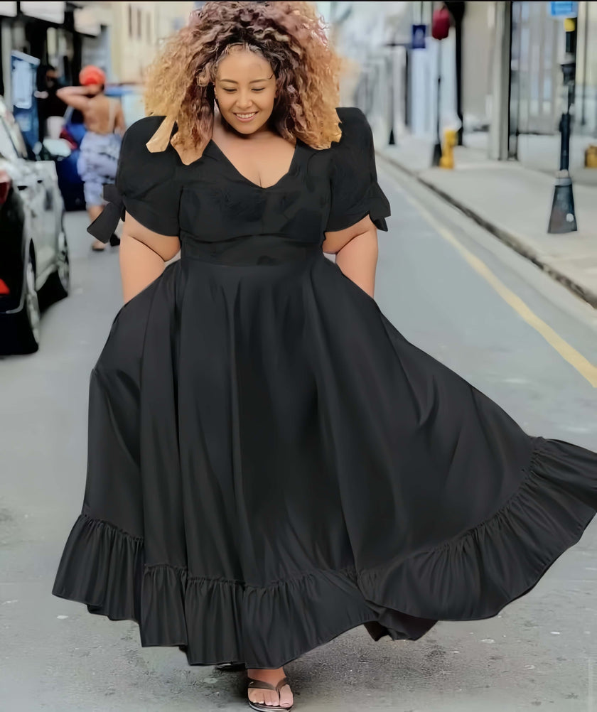 Black puff-sleeve midi dress with ruffle hem and gathered skirt
