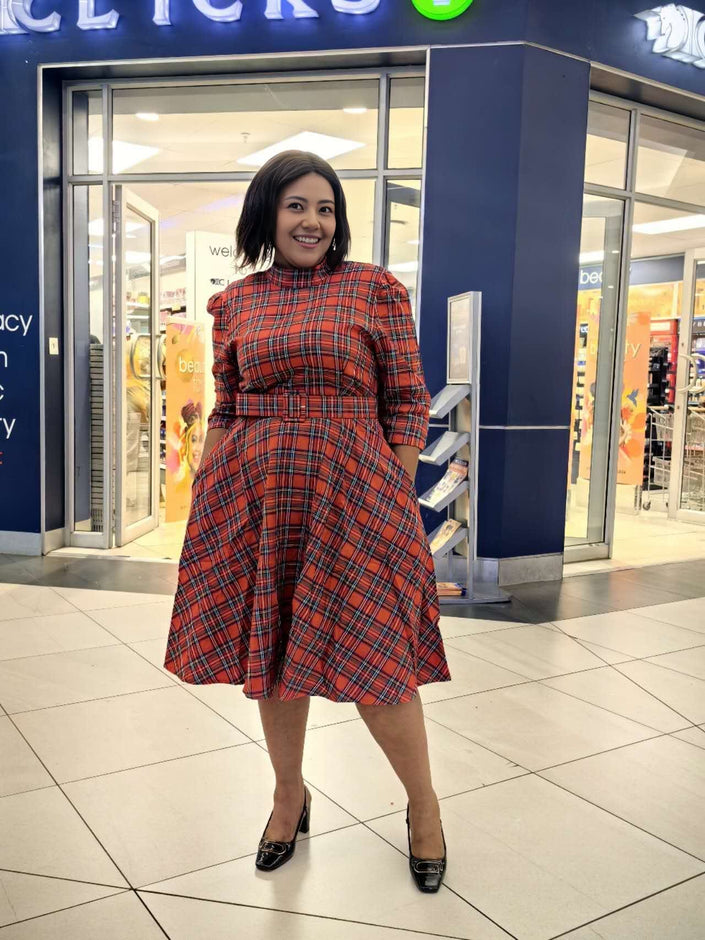 Plaid flared knee-length dress in red with long sleeves