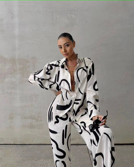 Black-and-white abstract print twin set: button-up shirt with wide-leg pants
