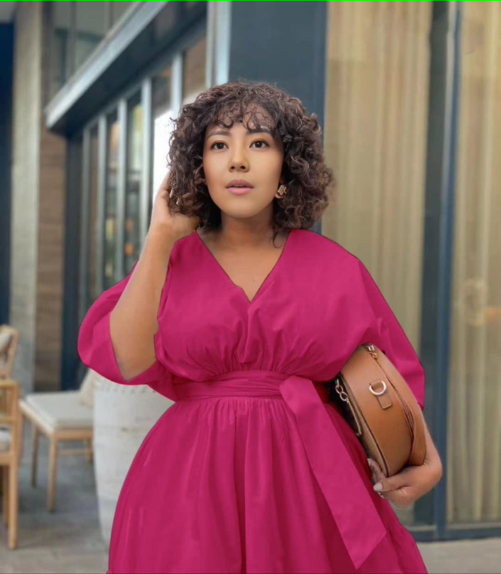 Purple tiered midi dress with puff sleeves and gathered adjustable waist