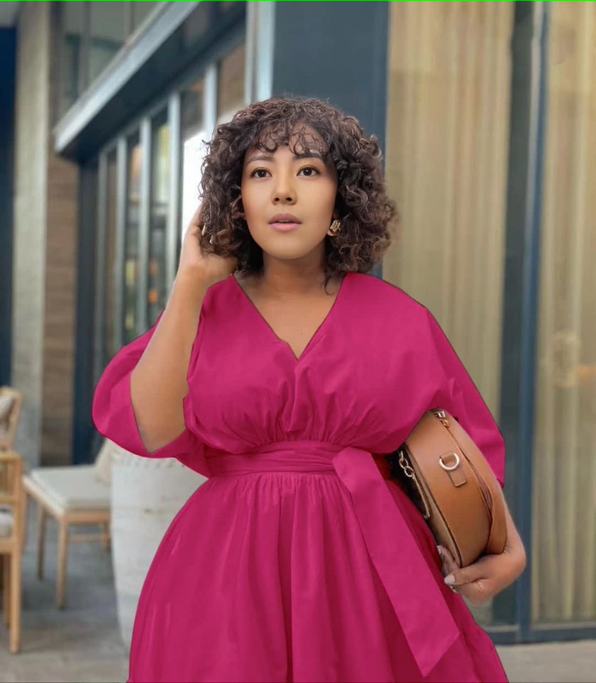 Purple tiered midi dress with puff sleeves and gathered adjustable waist