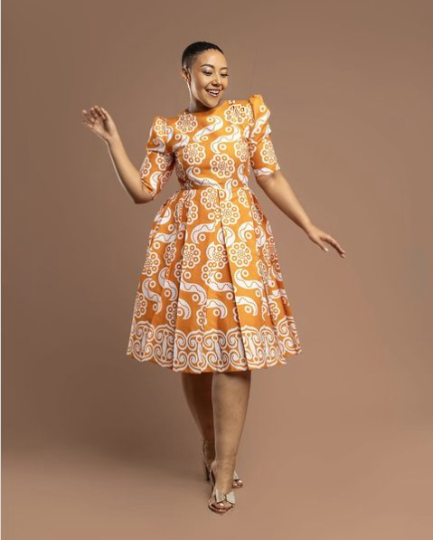 Traditional Flared Skirt Dress with Swirl and Floral Motifs