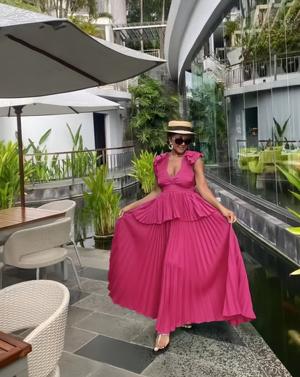 Deep-pink maxi dress with puff sleeves and tiered ruffle skirt