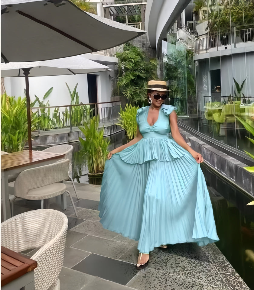 Sky-blue maxi dress with puff sleeves and tiered ruffle skirt