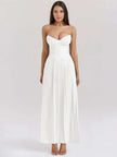 White strapless pleated maxi dress with sweetheart neckline and smocked bodice