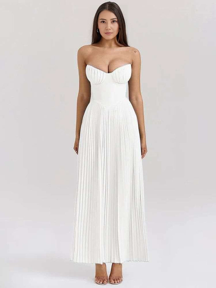 White strapless pleated maxi dress with sweetheart neckline and smocked bodice