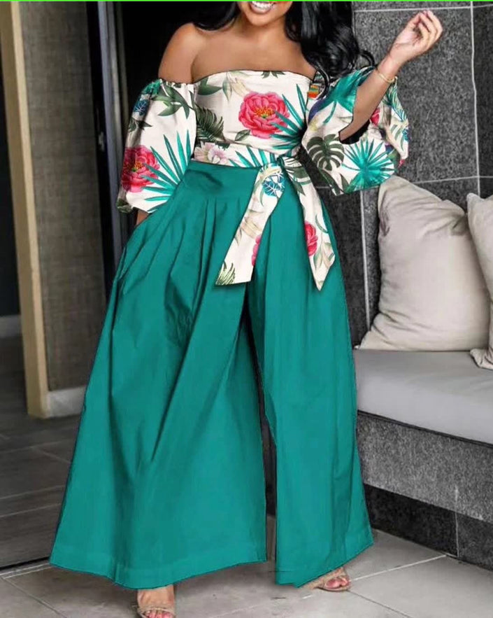 Off-shoulder floral jumpsuit, green wide-leg pants and tied waist