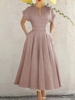 Mauve A-line midi dress with pleated skirt, short sleeves, keyhole neckline, waist buttons