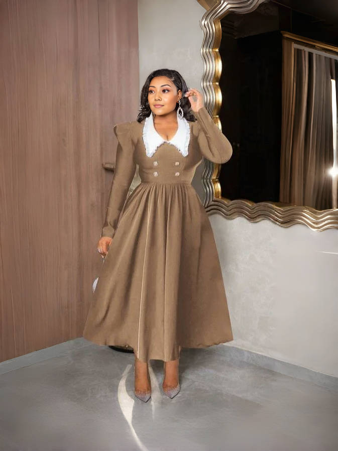 Tan midi dress with contrast white collar, long sleeves, and buttoned bodice