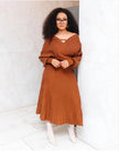 Knit top and pleated midi skirt set in rust brown, V-neck long sleeves