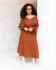Knit top and pleated midi skirt set in rust brown, V-neck long sleeves