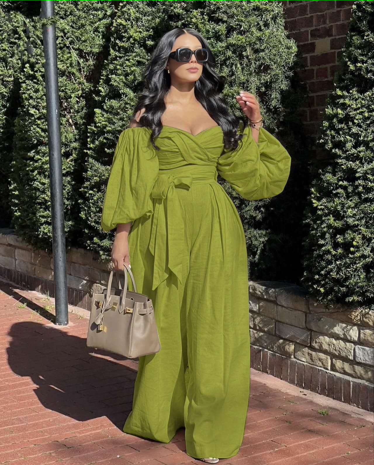 Yellow-green off-shoulder puff-sleeve jumpsuit, ruched bodice, wide-leg trousers