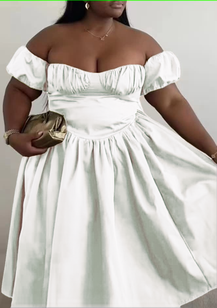 White off-shoulder dress with puff sleeves and gathered full skirt