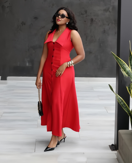 Red sleeveless lapel midi dress with button front and V-neck, flowing midi length.