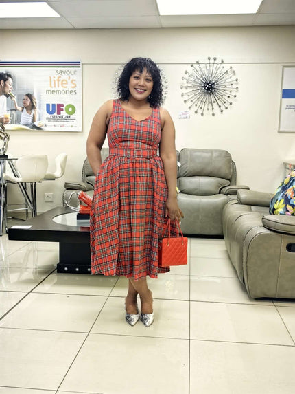 Sleeveless checkered midi dress with flared skirt, red and blue plaid pattern