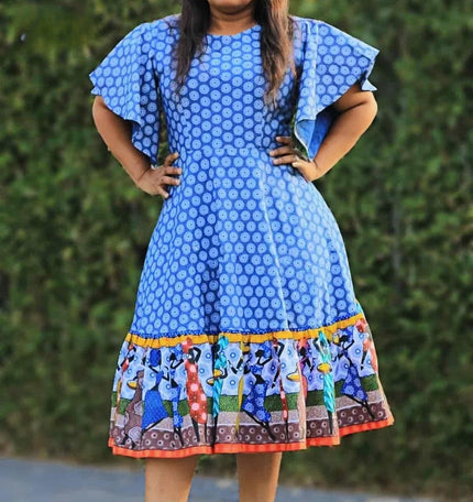Blue mixed-print knee dress with wide sleeves and tiered multicolor skirt hem