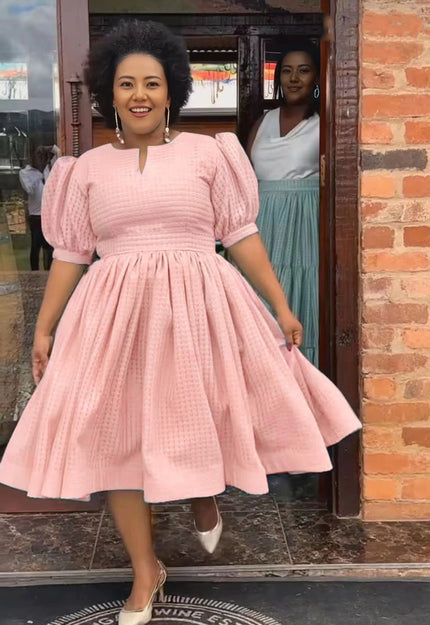 Textured midi dress, puff sleeves, smocked waist, full skirt in pink