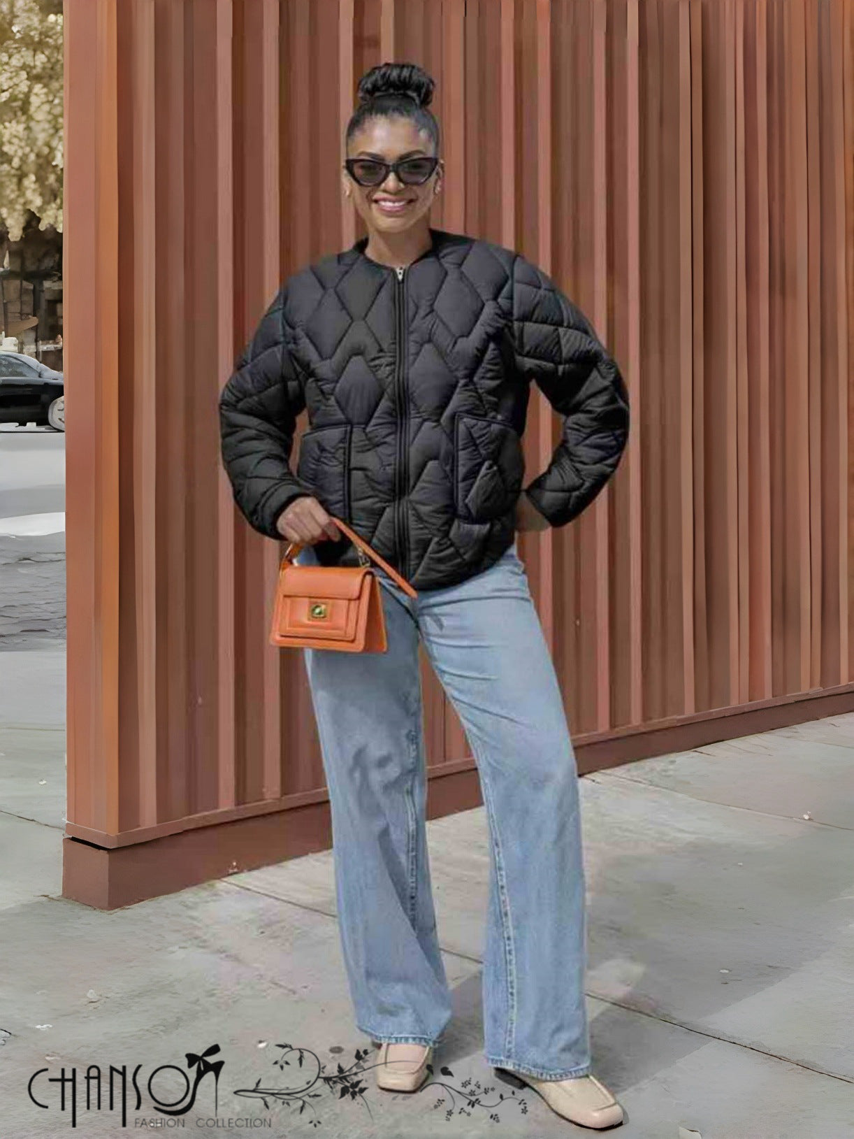Black collarless quilted jacket, full zip front and diamond-quilt pattern