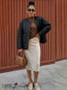 Black collarless quilted jacket with front zipper, diamond stitch pattern