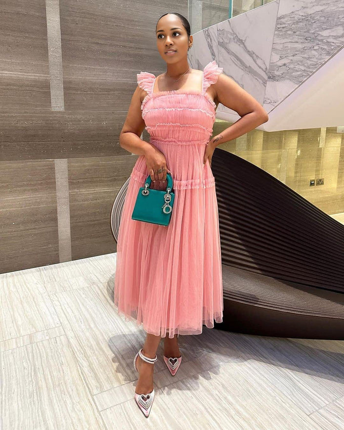 Pink sleeveless tiered ruffle midi dress with square neckline and gathered bodice