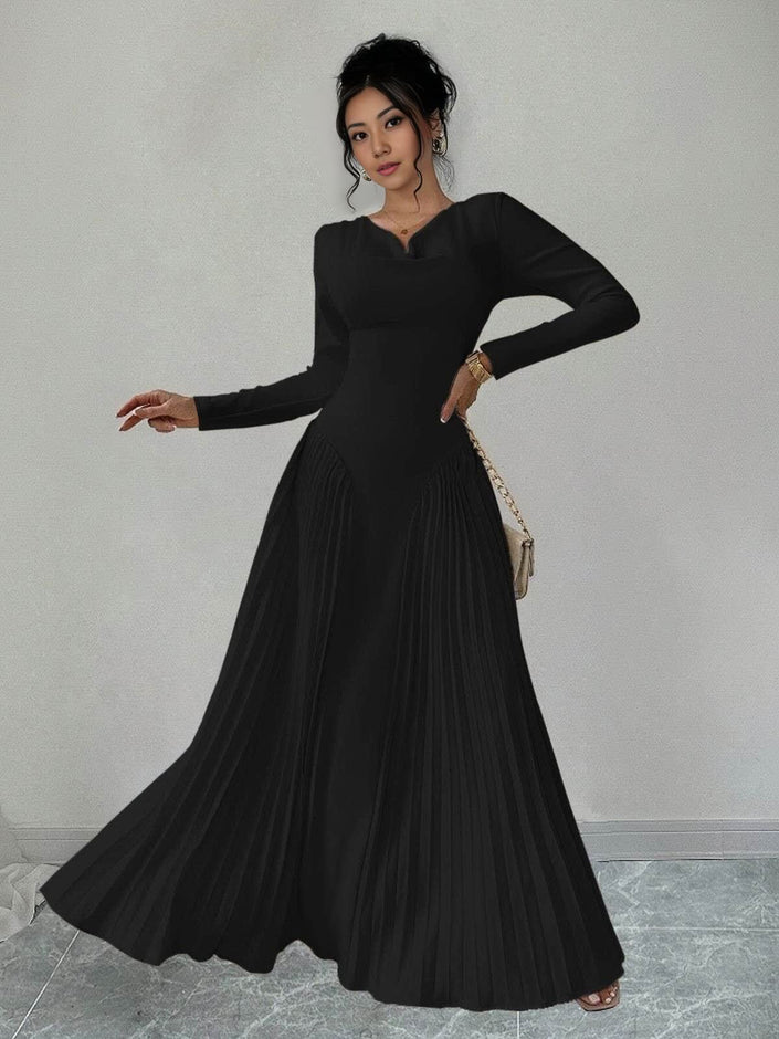 Black pleated maxi dress with long sleeves and fitted waist, full flared skirt
