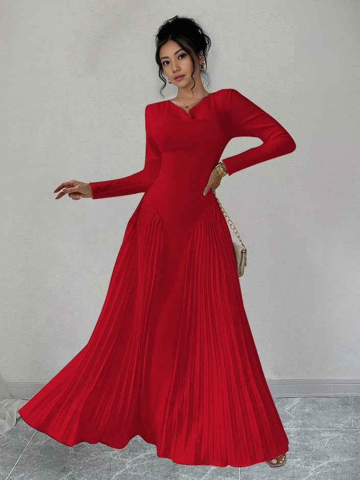Red pleated maxi dress with long sleeves and fitted waist, wide flared skirt