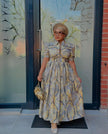Geometric puff-sleeve maxi dress with gathered skirt and fitted bodice