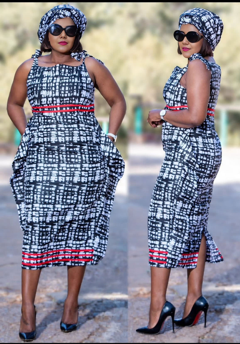Sleeveless midi dress, black-and-white geometric print with red contrast trim