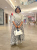 Traditional Flared Skirt Dress with Fitted Bodice and Circular Pattern Design