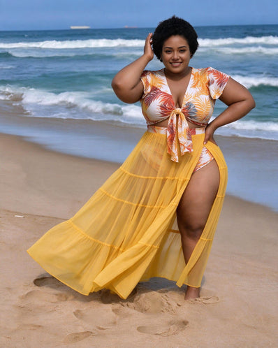 Mustard tropical leaf swim set with tie-front top, matching bottoms and sheer tiered maxi skirt
