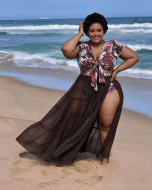 Brown tropical leaf swim set with tie-front top, matching bottoms and sheer tiered maxi skirt