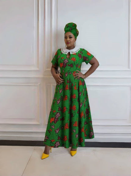 Green floral maxi dress with lace collar, short sleeves and full skirt